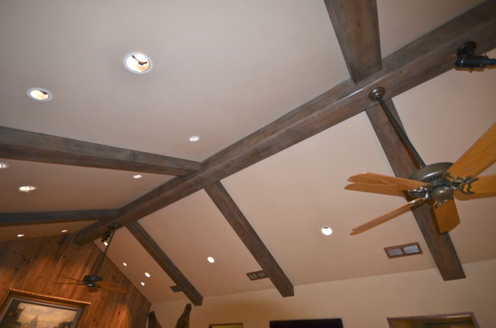 Ceiling with Wooden Support Beams and Fan